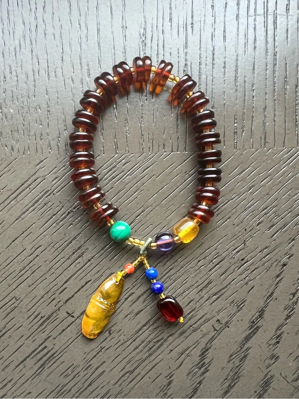 Blood amber donut bracelet with charm 9mm SIZE 6.5’
